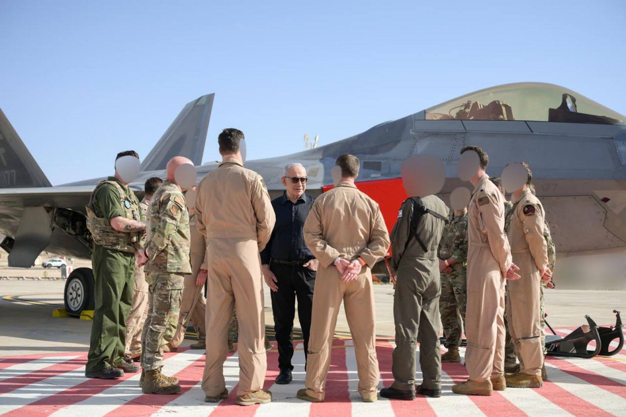 Commander in Chief of the US Armed Forces, Netanyahu visited Ovda Air Base in Eilat where U.S. F-22 Raptors are currently deployed.

Photos show him posing with American pilots and aircrew under U.S. and Israeli flags, then getting a personal walkthrough of the F-22, one of the most advanced stealth fighters in the world, never sold to any foreign military.

The man facing an ICC arrest warrant is getting a tour of America's most classified operational aircraft.