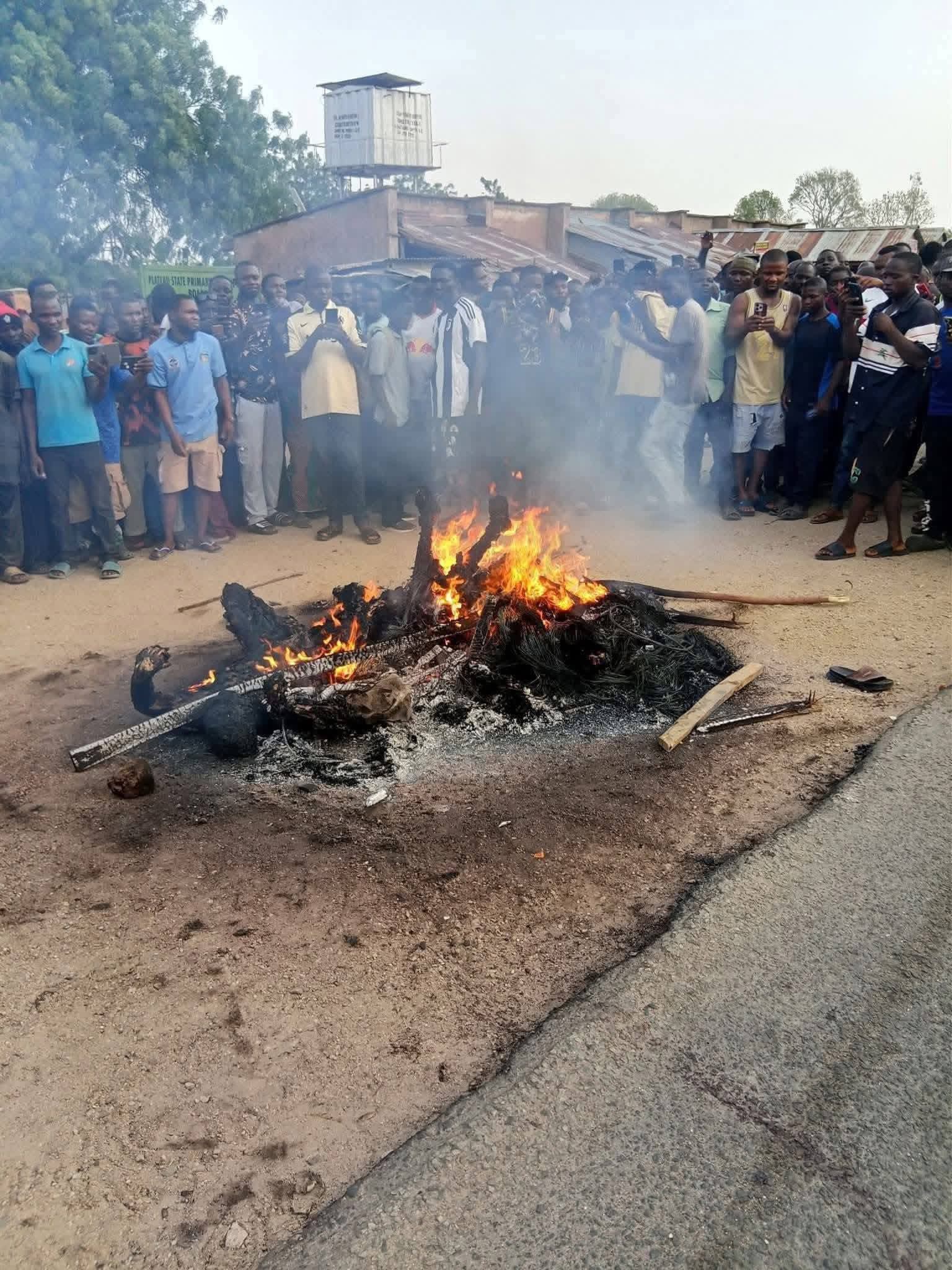 Angry Mob Burns To Ashes Three Suspected Killers of Plateau Monarch in Langtang North, Plateau State